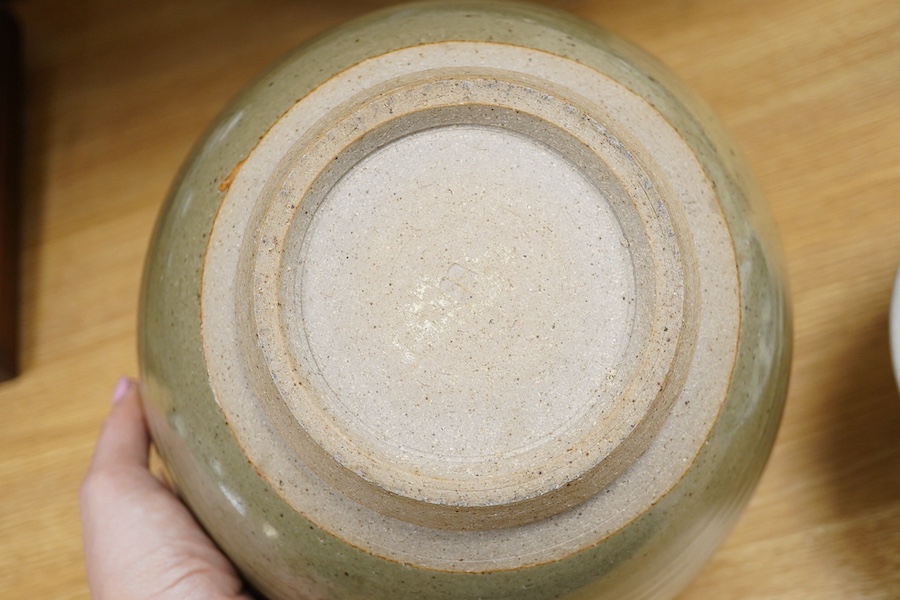 Three studio pottery bowls, one signed ‘A’ to the base, largest 34cm in diameter. Condition - good